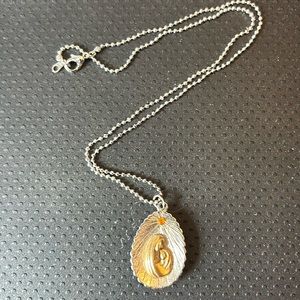 Beautiful vintage limited edition Madonna/child necklace!
